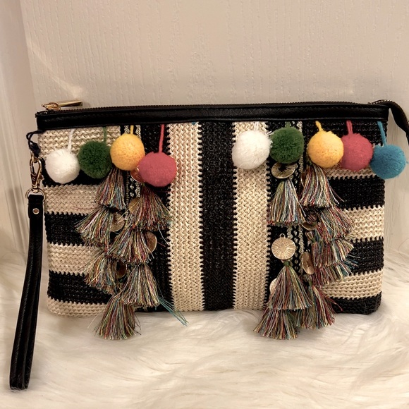 Aldo Handbags - Aldo clutch purse. Black and white striped with pompoms fringe and lots of fun